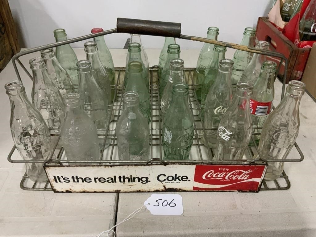 24 Coke bottles in metal Coke carrier - AuctionsOntario.ca