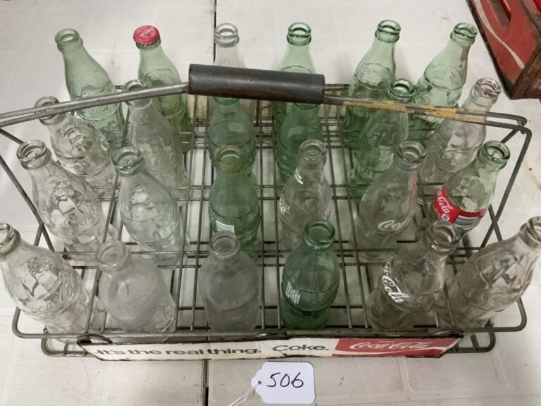 24 Coke bottles in metal Coke carrier - AuctionsOntario.ca